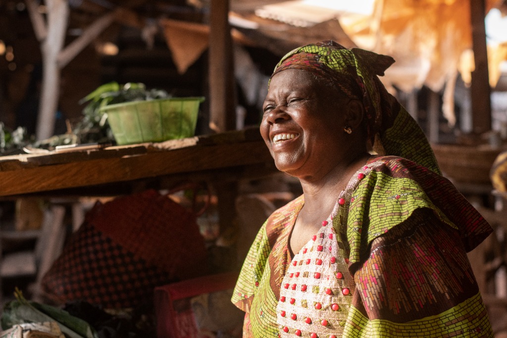 Smiling rural market trader in Northern Nigeria — Where People Prosper